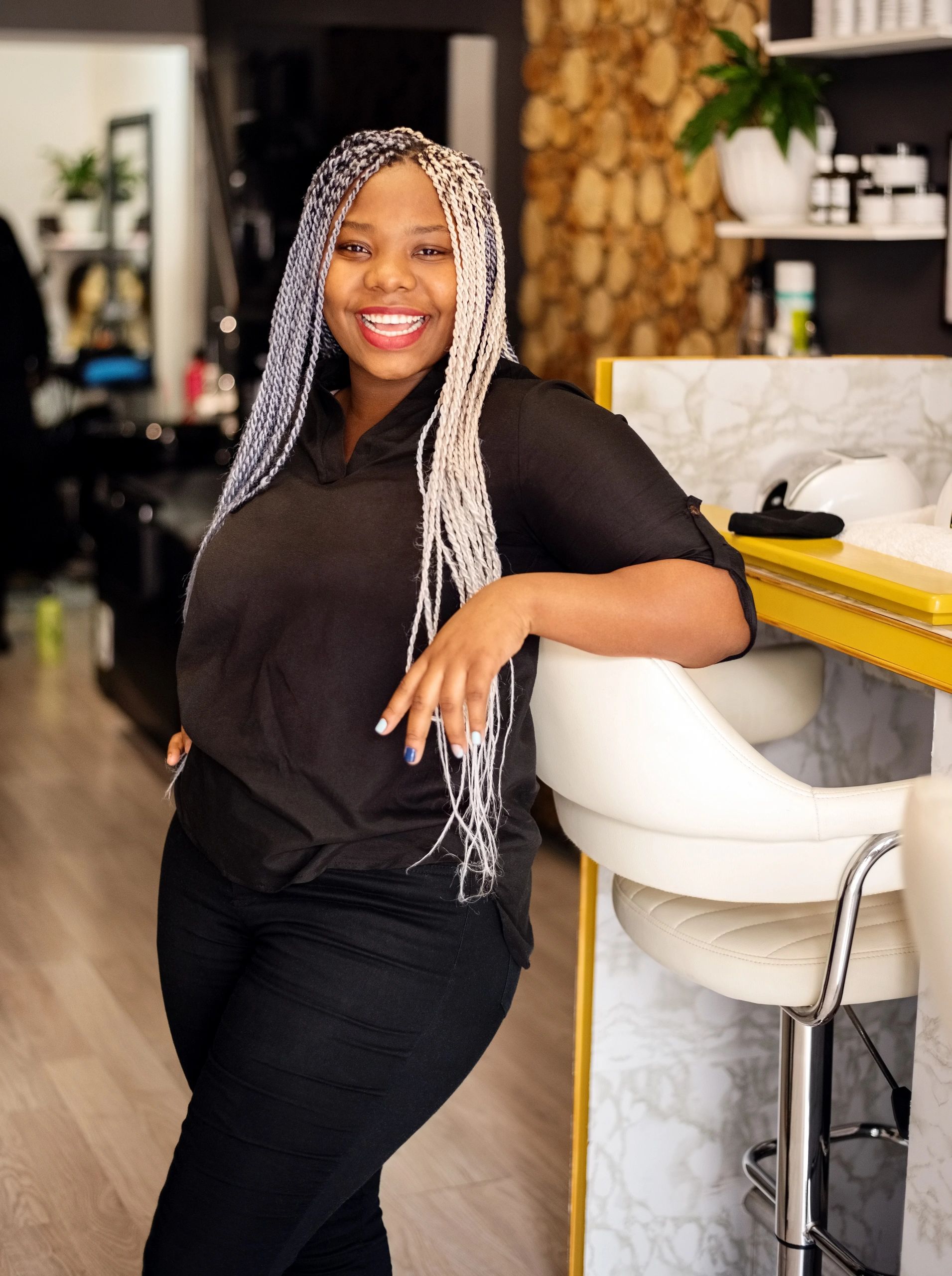 Confident salon professional standing in a beauty salon