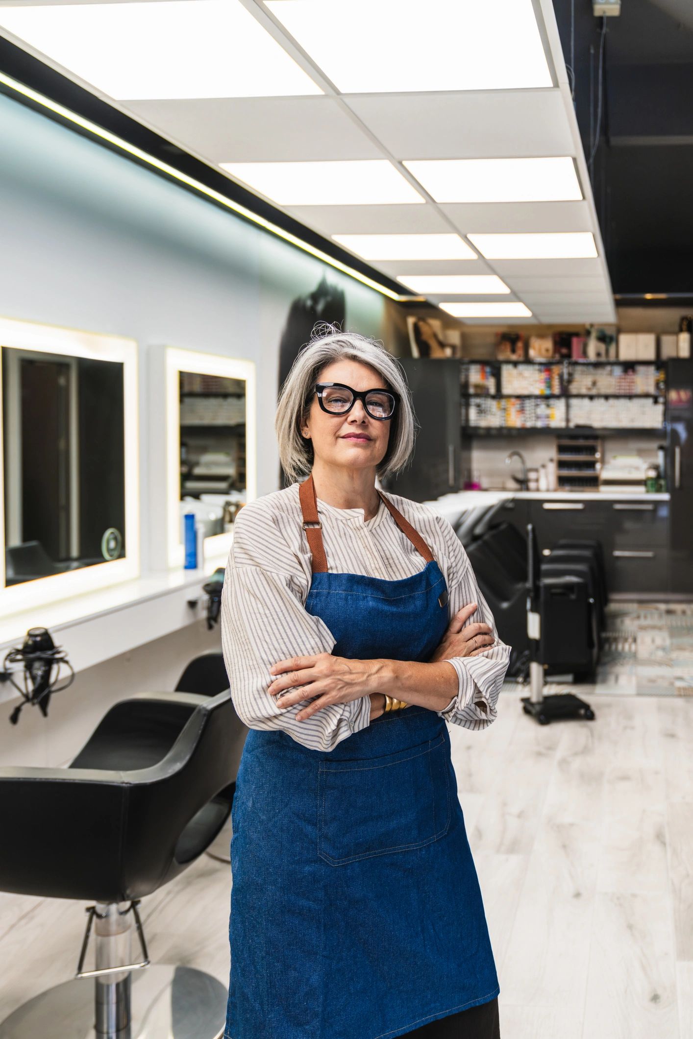 Professional female hairstylist in salon