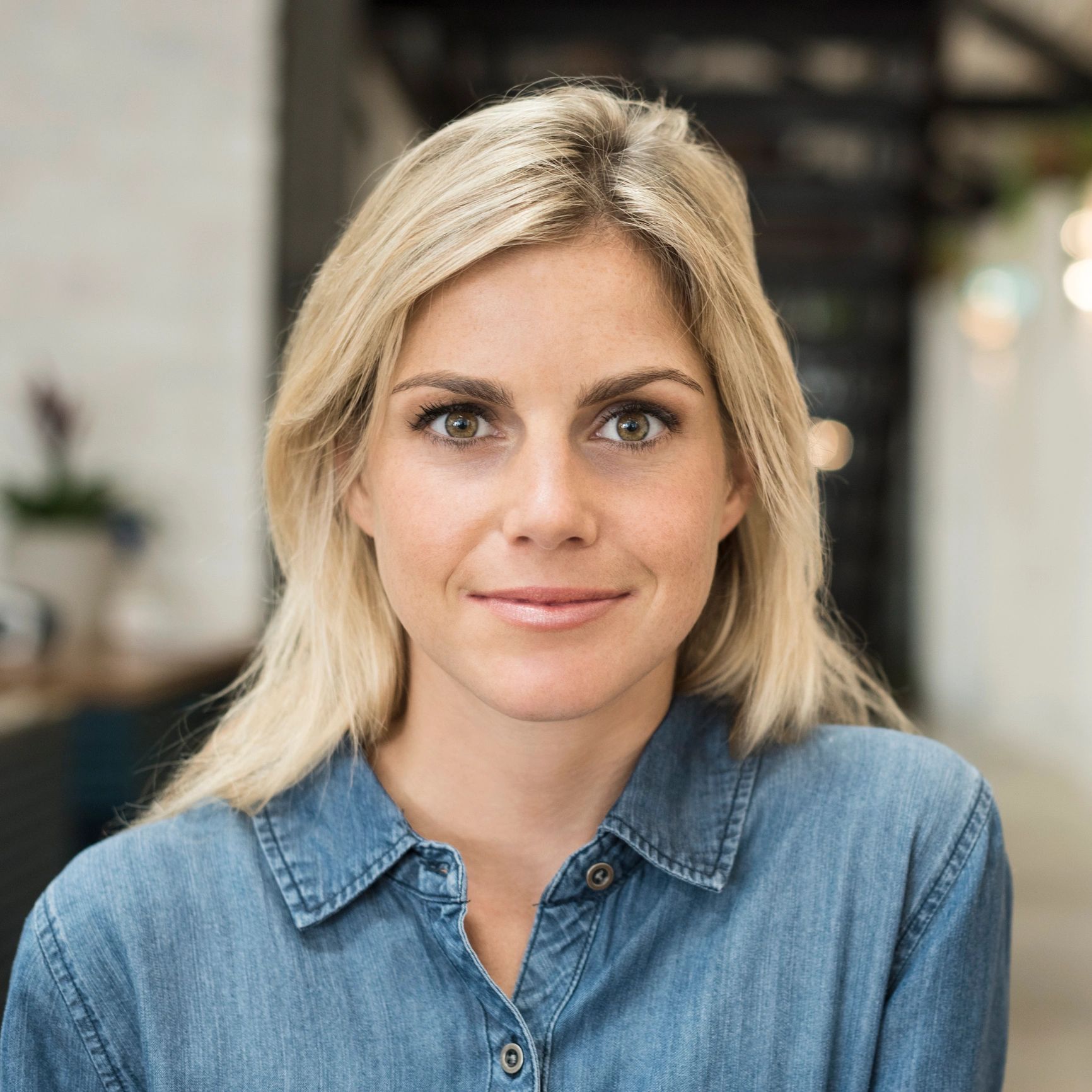 Smiling client-style portrait representing guest experience